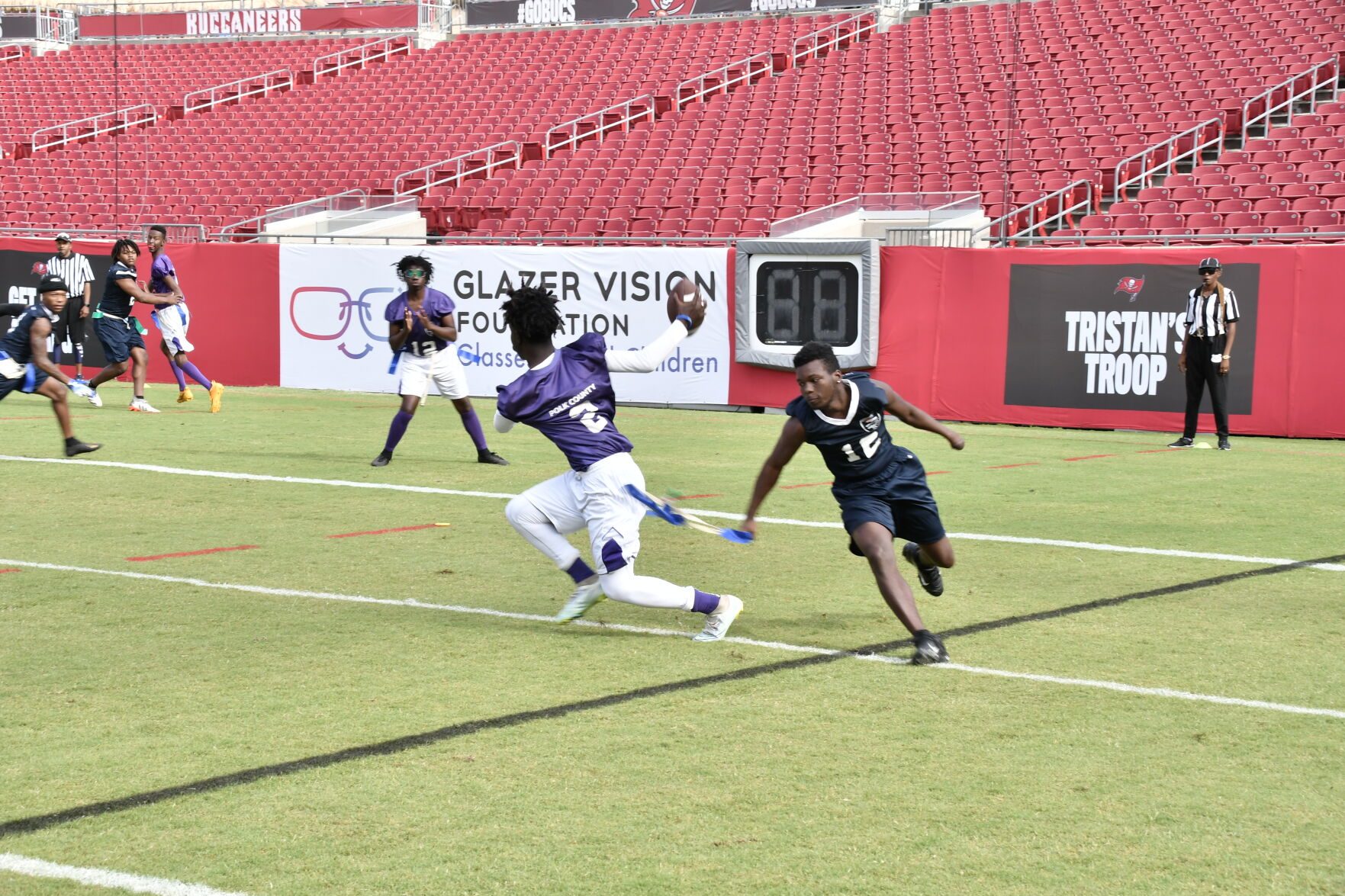 Graham grabs his opponents flag.